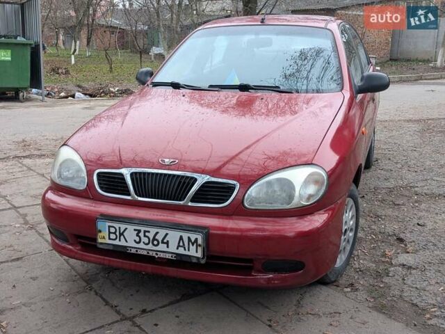 Красный Дэу Ланос, объемом двигателя 1.4 л и пробегом 156 тыс. км за 1950 $, фото 2 на Automoto.ua