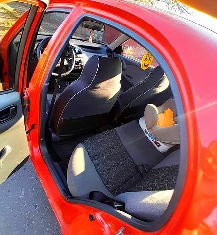 Красный Дэу Ланос, объемом двигателя 1.5 л и пробегом 181 тыс. км за 1999 $, фото 1 на Automoto.ua