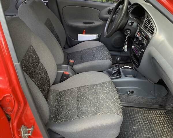 Червоний Деу Ланос, об'ємом двигуна 1.5 л та пробігом 93 тис. км за 2999 $, фото 13 на Automoto.ua