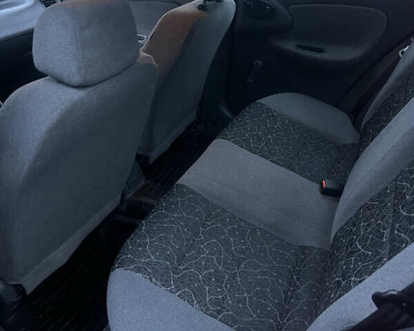 Красный Дэу Ланос, объемом двигателя 1.5 л и пробегом 175 тыс. км за 2500 $, фото 10 на Automoto.ua