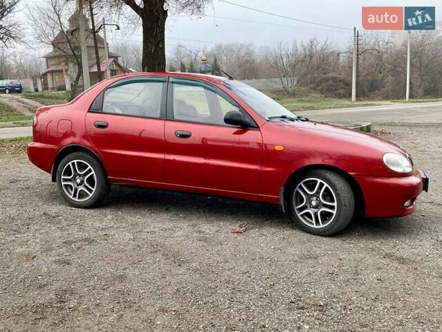 Красный Дэу Ланос, объемом двигателя 1.4 л и пробегом 103 тыс. км за 2700 $, фото 2 на Automoto.ua