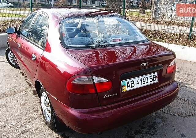 Красный Дэу Ланос, объемом двигателя 1.5 л и пробегом 126 тыс. км за 2000 $, фото 5 на Automoto.ua