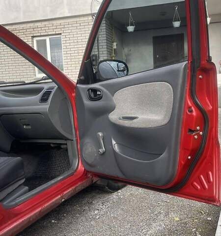 Красный Дэу Ланос, объемом двигателя 1.5 л и пробегом 160 тыс. км за 2100 $, фото 8 на Automoto.ua