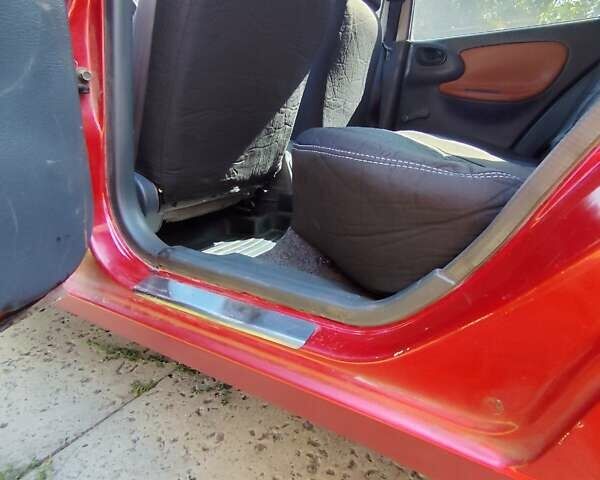 Деу Ланос 2008 у Полтаві на Automoto.ua Червоний Деу Ланос, об'ємом двигуна 1.5 л та пробігом 118 тис. км за 2950 $, фото 6 на Automoto.ua