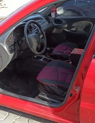 Красный Дэу Ланос, объемом двигателя 1.5 л и пробегом 437 тыс. км за 2150 $, фото 6 на Automoto.ua