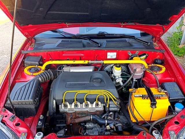 Красный Дэу Ланос, объемом двигателя 1.4 л и пробегом 130 тыс. км за 3300 $, фото 4 на Automoto.ua