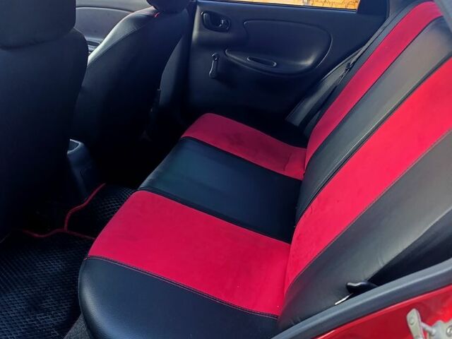 Красный Дэу Ланос, объемом двигателя 1.4 л и пробегом 130 тыс. км за 3300 $, фото 6 на Automoto.ua