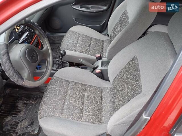 Красный Дэу Ланос, объемом двигателя 1.5 л и пробегом 253 тыс. км за 2900 $, фото 8 на Automoto.ua