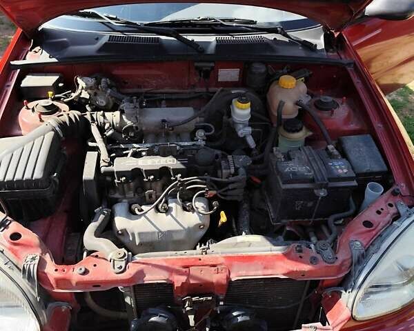 Деу Ланос 2008 у Полтаві на Automoto.ua Червоний Деу Ланос, об'ємом двигуна 1.5 л та пробігом 118 тис. км за 2950 $, фото 10 на Automoto.ua