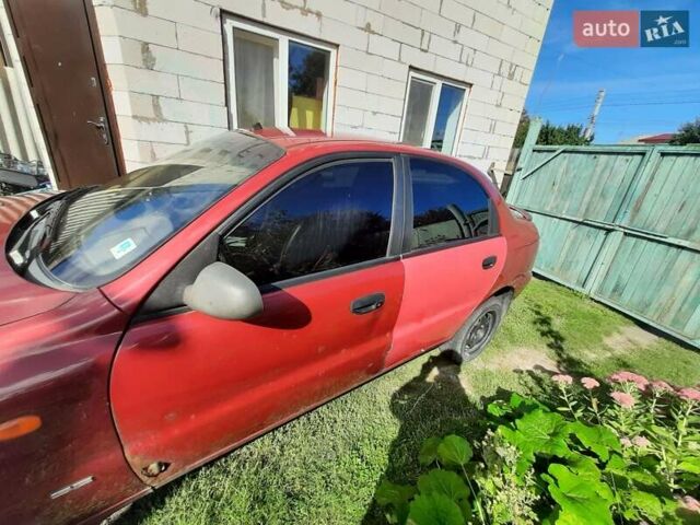 Деу Ланос 2008 у Києві на Automoto.ua Червоний Деу Ланос, об'ємом двигуна 1.5 л та пробігом 180 тис. км за 1400 $, фото 5 на Automoto.ua