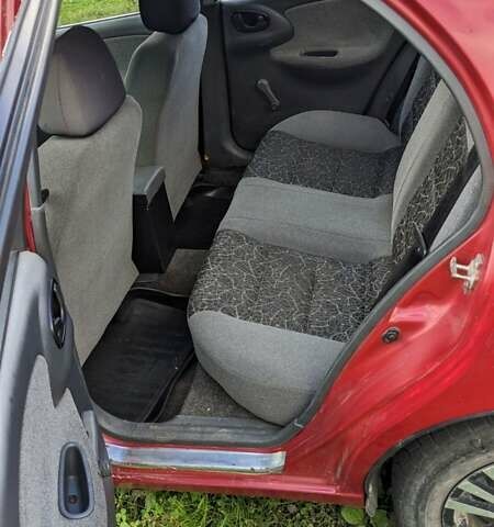 Красный Дэу Ланос, объемом двигателя 1.5 л и пробегом 180 тыс. км за 2000 $, фото 3 на Automoto.ua