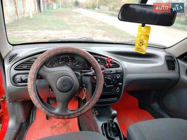 Деу Ланос 2008 у Богодухове на Automoto.ua Червоний Деу Ланос, об'ємом двигуна 1.5 л та пробігом 153 тис. км за 2600 $, фото 10 на Automoto.ua