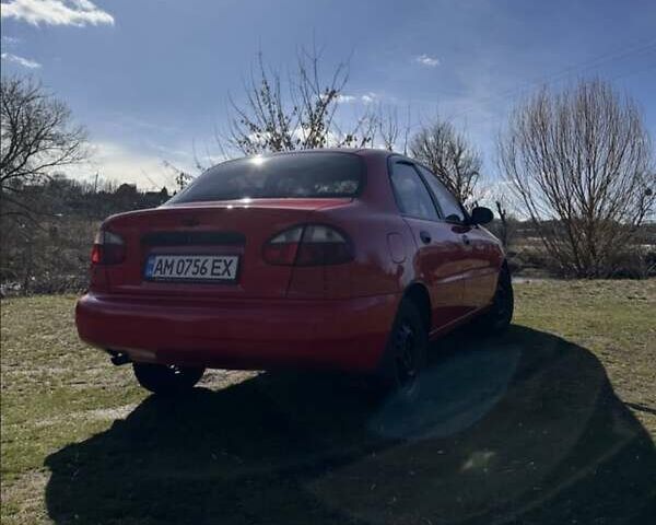 Красный Дэу Ланос, объемом двигателя 1.5 л и пробегом 197 тыс. км за 2400 $, фото 7 на Automoto.ua