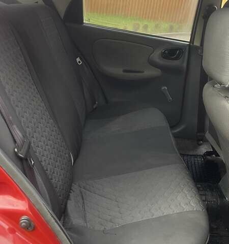 Красный Дэу Ланос, объемом двигателя 1.5 л и пробегом 160 тыс. км за 2100 $, фото 11 на Automoto.ua