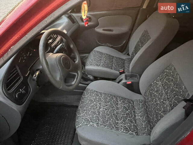 Красный Дэу Ланос, объемом двигателя 1.5 л и пробегом 205 тыс. км за 2200 $, фото 10 на Automoto.ua