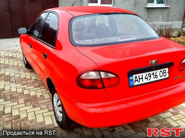 Красный Дэу Ланос, объемом двигателя 1.5 л и пробегом 181 тыс. км за 1999 $, фото 6 на Automoto.ua