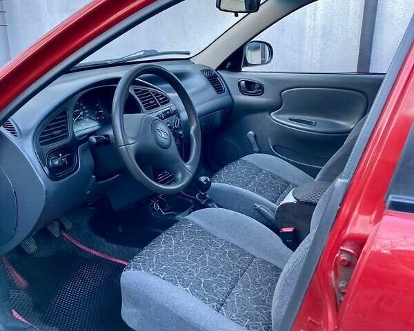 Красный Дэу Ланос, объемом двигателя 1.4 л и пробегом 103 тыс. км за 2700 $, фото 3 на Automoto.ua