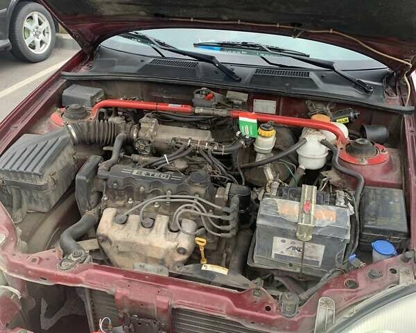 Красный Дэу Ланос, объемом двигателя 1.5 л и пробегом 170 тыс. км за 3700 $, фото 11 на Automoto.ua