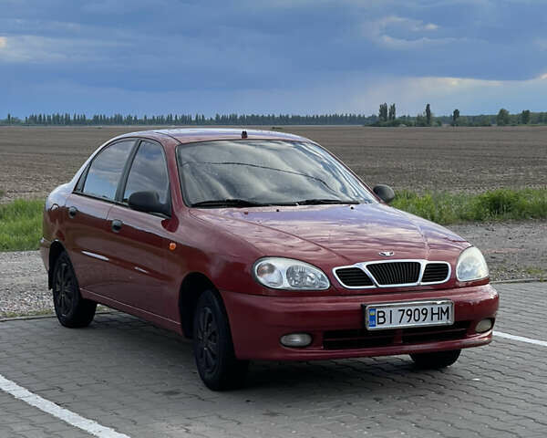 Красный Дэу Ланос, объемом двигателя 1.5 л и пробегом 240 тыс. км за 2200 $, фото 3 на Automoto.ua