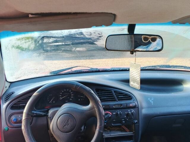 Красный Дэу Ланос, объемом двигателя 1.5 л и пробегом 100 тыс. км за 1500 $, фото 5 на Automoto.ua