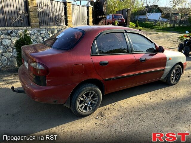 Красный Дэу Ланос, объемом двигателя 1.4 л и пробегом 126 тыс. км за 1500 $, фото 3 на Automoto.ua