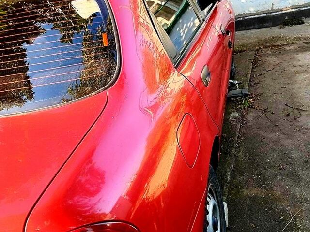 Червоний Деу Ланос, об'ємом двигуна 1.5 л та пробігом 112 тис. км за 1900 $, фото 6 на Automoto.ua