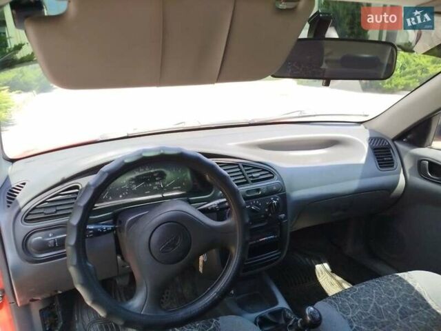 Червоний Деу Ланос, об'ємом двигуна 1.5 л та пробігом 58 тис. км за 4000 $, фото 19 на Automoto.ua