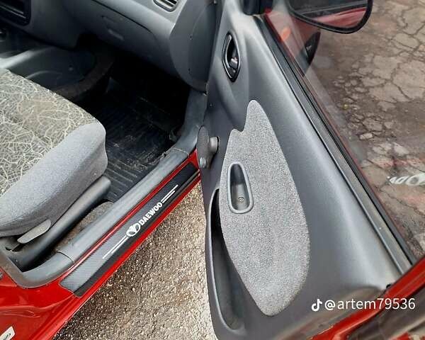Красный Дэу Ланос, объемом двигателя 1.5 л и пробегом 113 тыс. км за 2500 $, фото 14 на Automoto.ua