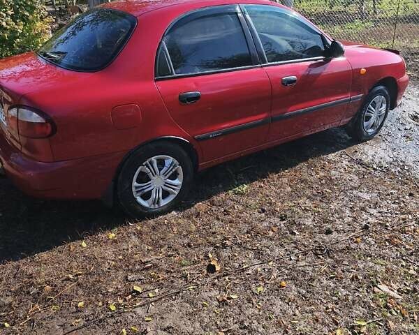 Красный Дэу Ланос, объемом двигателя 1.5 л и пробегом 170 тыс. км за 2200 $, фото 9 на Automoto.ua