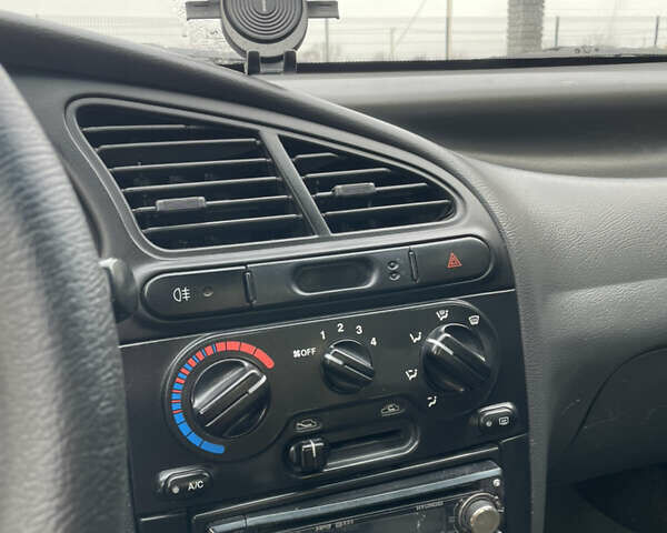 Червоний Деу Ланос, об'ємом двигуна 1.5 л та пробігом 385 тис. км за 2600 $, фото 9 на Automoto.ua