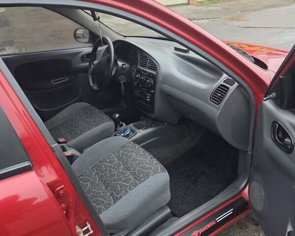 Червоний Деу Ланос, об'ємом двигуна 1.6 л та пробігом 220 тис. км за 3000 $, фото 12 на Automoto.ua