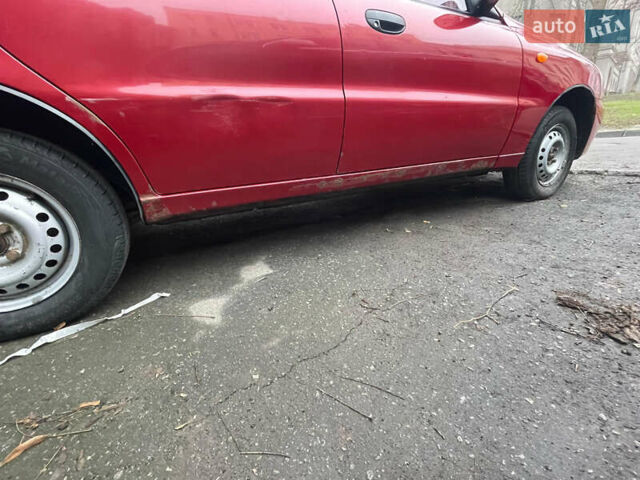 Красный Дэу Ланос, объемом двигателя 1.4 л и пробегом 201 тыс. км за 3200 $, фото 5 на Automoto.ua