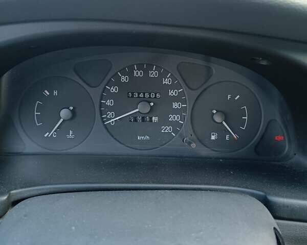 Красный Дэу Ланос, объемом двигателя 1.5 л и пробегом 135 тыс. км за 2300 $, фото 5 на Automoto.ua