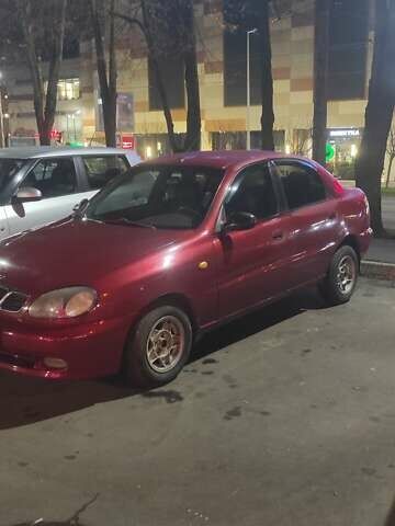 Красный Дэу Ланос, объемом двигателя 1.5 л и пробегом 300 тыс. км за 2100 $, фото 1 на Automoto.ua