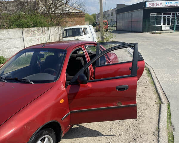 Червоний Деу Ланос, об'ємом двигуна 1.5 л та пробігом 198 тис. км за 1650 $, фото 1 на Automoto.ua