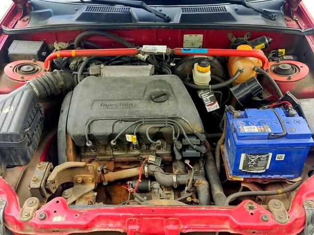 Деу Ланос 2008 у Харкові на Automoto.ua Червоний Деу Ланос, об'ємом двигуна 1.4 л та пробігом 157 тис. км за 2000 $, фото 8 на Automoto.ua