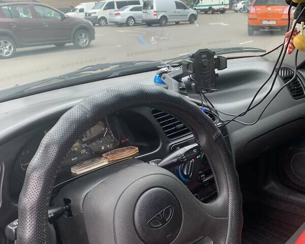 Красный Дэу Ланос, объемом двигателя 1.5 л и пробегом 170 тыс. км за 3700 $, фото 10 на Automoto.ua