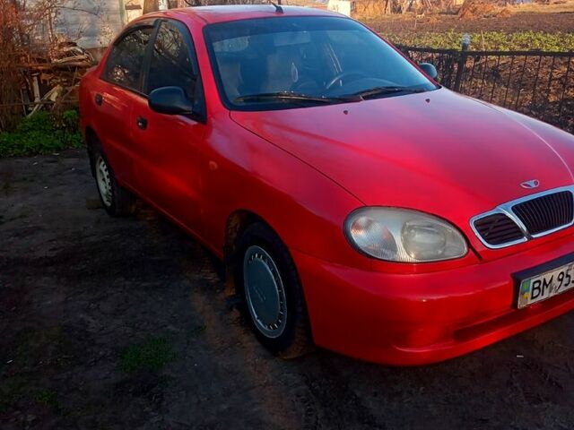 Красный Дэу Ланос, объемом двигателя 1.6 л и пробегом 507 тыс. км за 1300 $, фото 1 на Automoto.ua