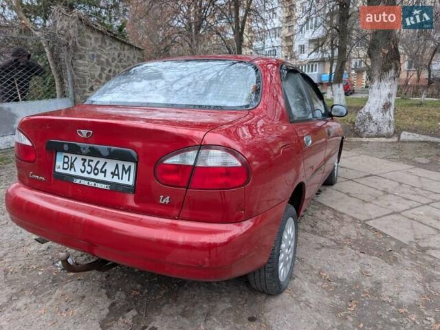 Красный Дэу Ланос, объемом двигателя 1.4 л и пробегом 156 тыс. км за 1950 $, фото 8 на Automoto.ua