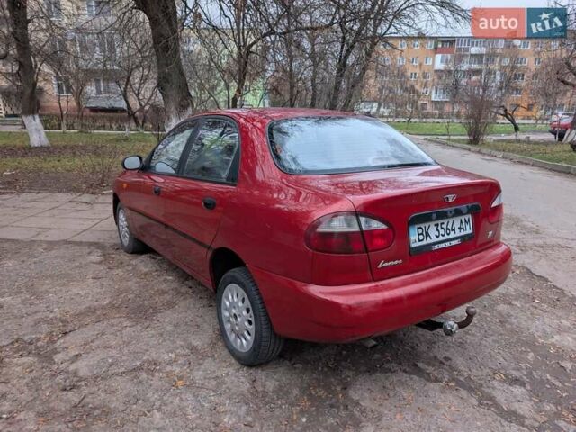 Красный Дэу Ланос, объемом двигателя 1.4 л и пробегом 156 тыс. км за 1950 $, фото 6 на Automoto.ua