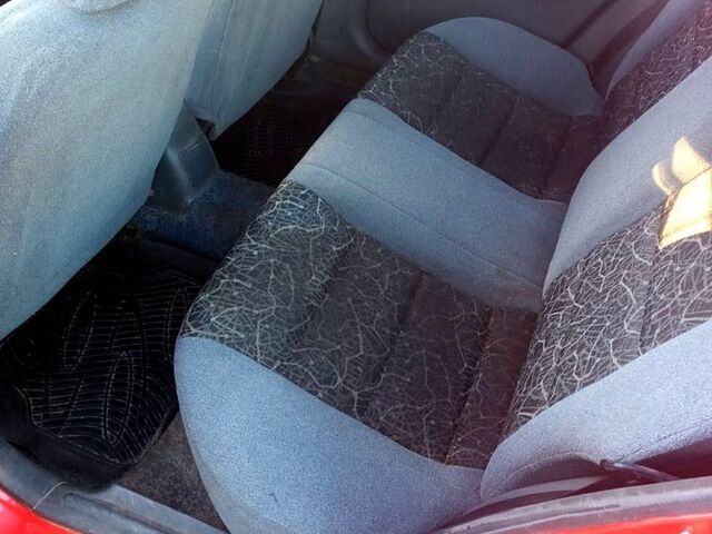 Красный Дэу Ланос, объемом двигателя 1.6 л и пробегом 507 тыс. км за 1300 $, фото 6 на Automoto.ua