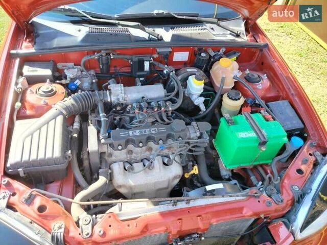 Деу Ланос 2008 у Богодухове на Automoto.ua Червоний Деу Ланос, об'ємом двигуна 1.5 л та пробігом 153 тис. км за 2600 $, фото 14 на Automoto.ua