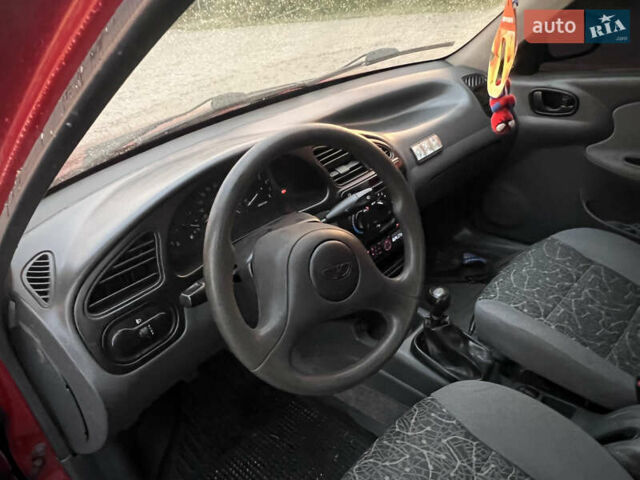 Красный Дэу Ланос, объемом двигателя 1.5 л и пробегом 205 тыс. км за 2200 $, фото 13 на Automoto.ua