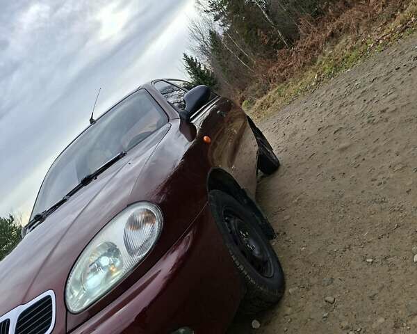 Красный Дэу Ланос, объемом двигателя 1.5 л и пробегом 211 тыс. км за 2800 $, фото 7 на Automoto.ua