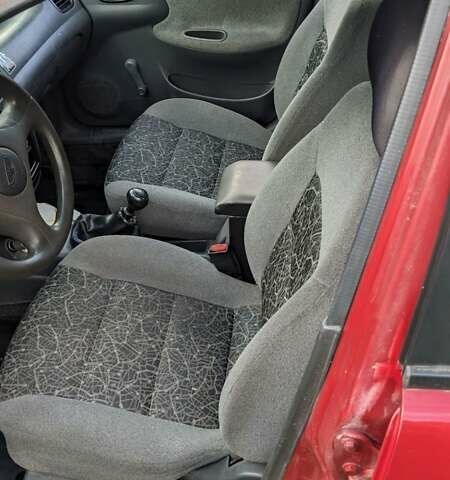 Красный Дэу Ланос, объемом двигателя 1.5 л и пробегом 180 тыс. км за 2000 $, фото 2 на Automoto.ua