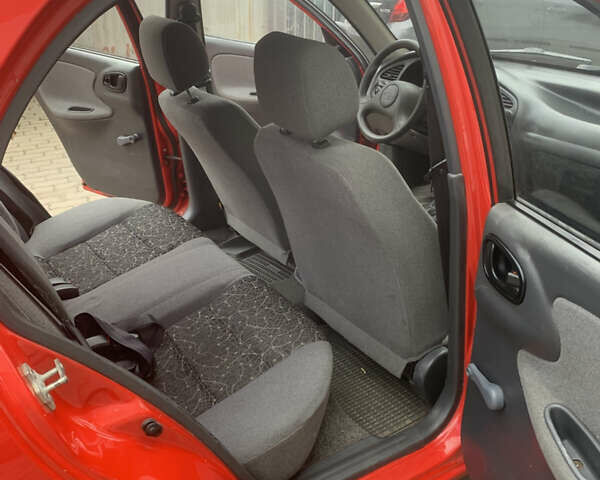 Красный Дэу Ланос, объемом двигателя 1.4 л и пробегом 73 тыс. км за 1750 $, фото 18 на Automoto.ua