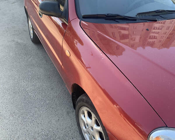 Красный Дэу Ланос, объемом двигателя 1.5 л и пробегом 144 тыс. км за 3000 $, фото 4 на Automoto.ua