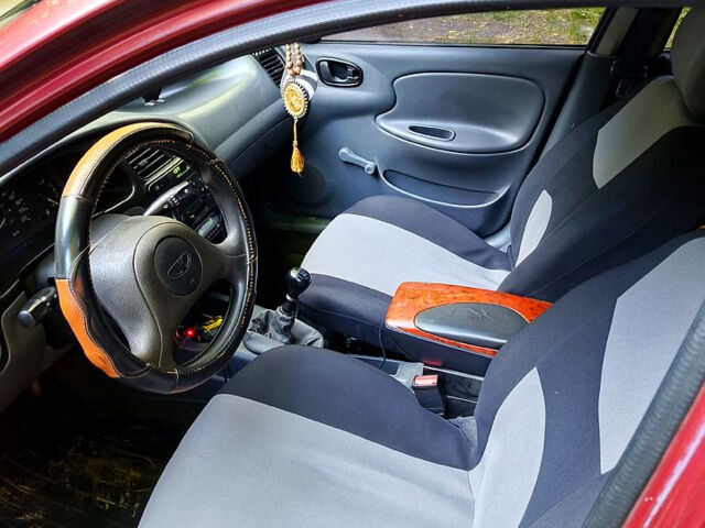 Красный Дэу Ланос, объемом двигателя 1.5 л и пробегом 213 тыс. км за 3000 $, фото 2 на Automoto.ua