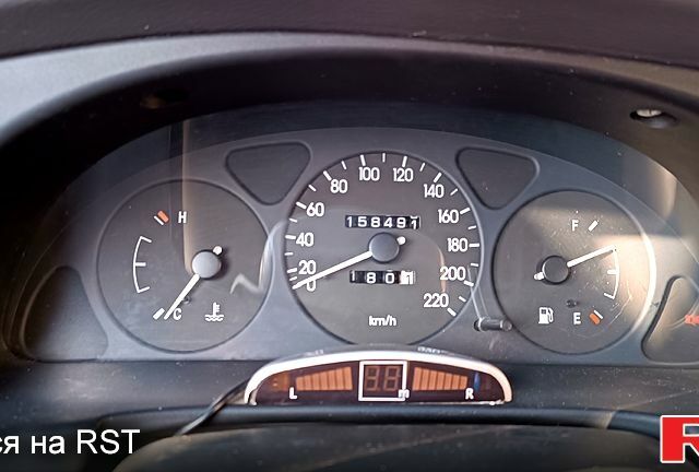 Красный Дэу Ланос, объемом двигателя 1.4 л и пробегом 161 тыс. км за 3000 $, фото 10 на Automoto.ua