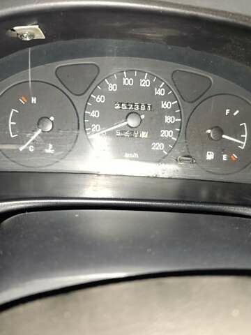 Красный Дэу Ланос, объемом двигателя 1.5 л и пробегом 257 тыс. км за 2000 $, фото 5 на Automoto.ua